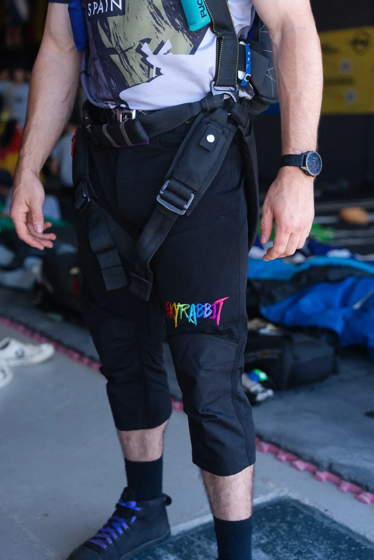 Close view of Skyrabbit shorts worn beneath a skydiving harness